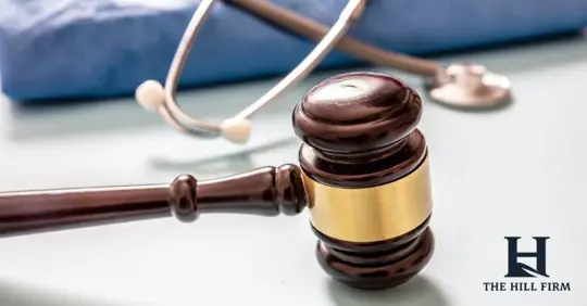 scrubs, stethoscope, and gavel