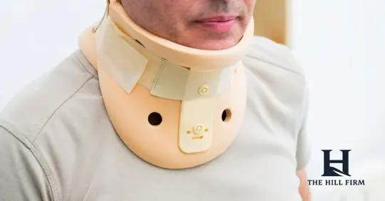 man with neck brace